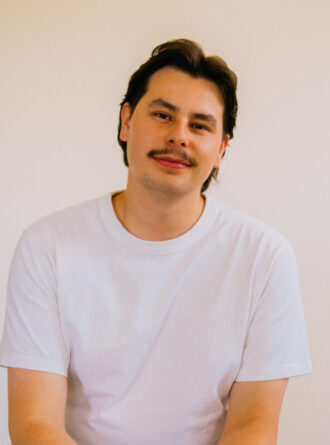 Image of Cooper  Olson, the Public Service Co-Director